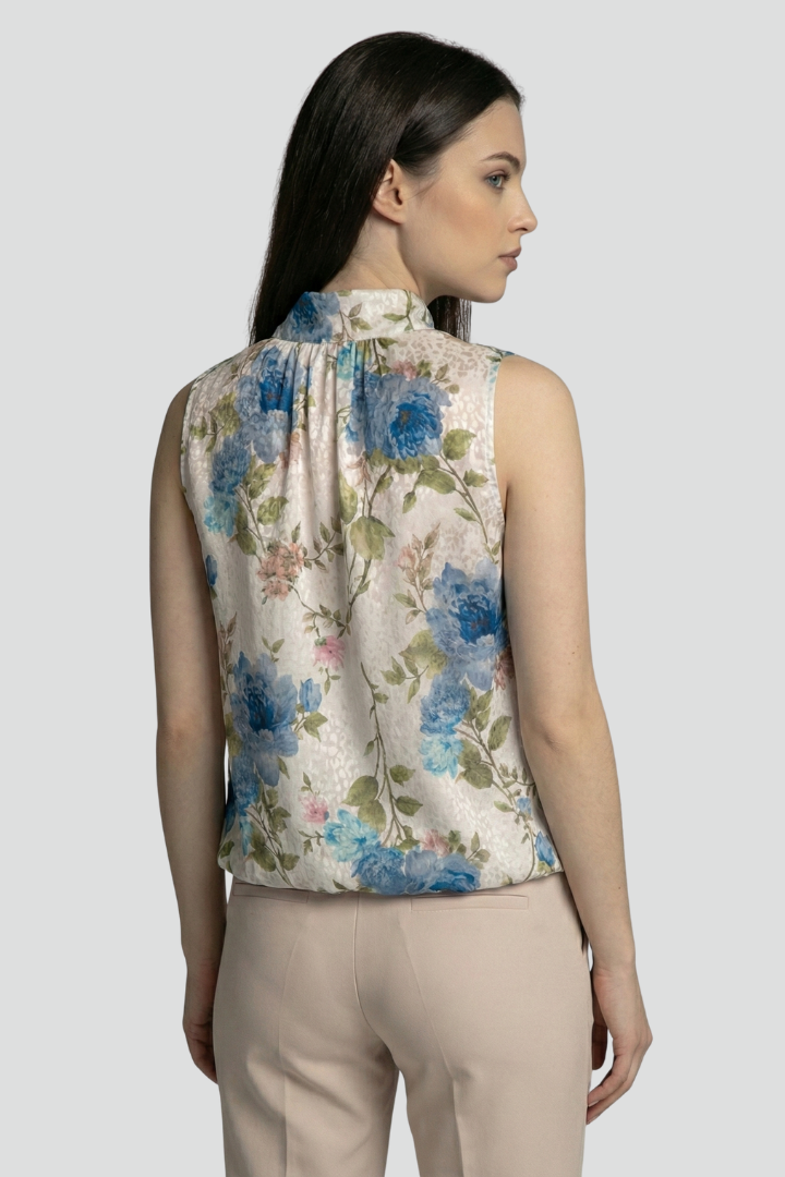 Women’s Sleeveless Blouse with High Neck and Floral Surface